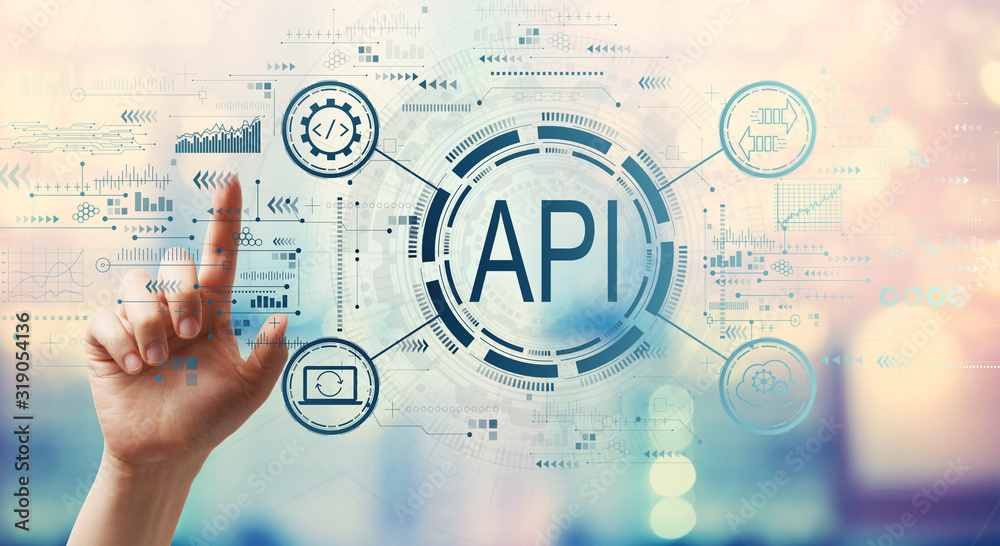 Fototapeta premium API - application programming interface concept API concept with hand pressing a button on a technology screen