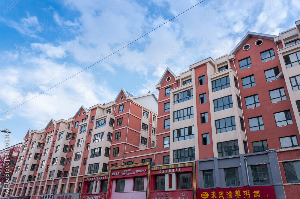 China, Heihe, July 2019: residential building, streets of the Chinese city of Heihe in the summer China, Heihe, July 2019: residential building, streets of the Chinese city of Heihe in the summer