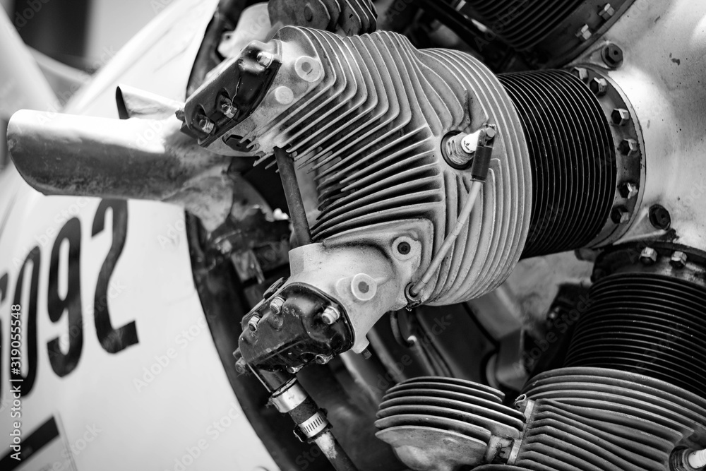 Black and white photograph of the engine of an airplane Black and white photograph of the engine of an airplane