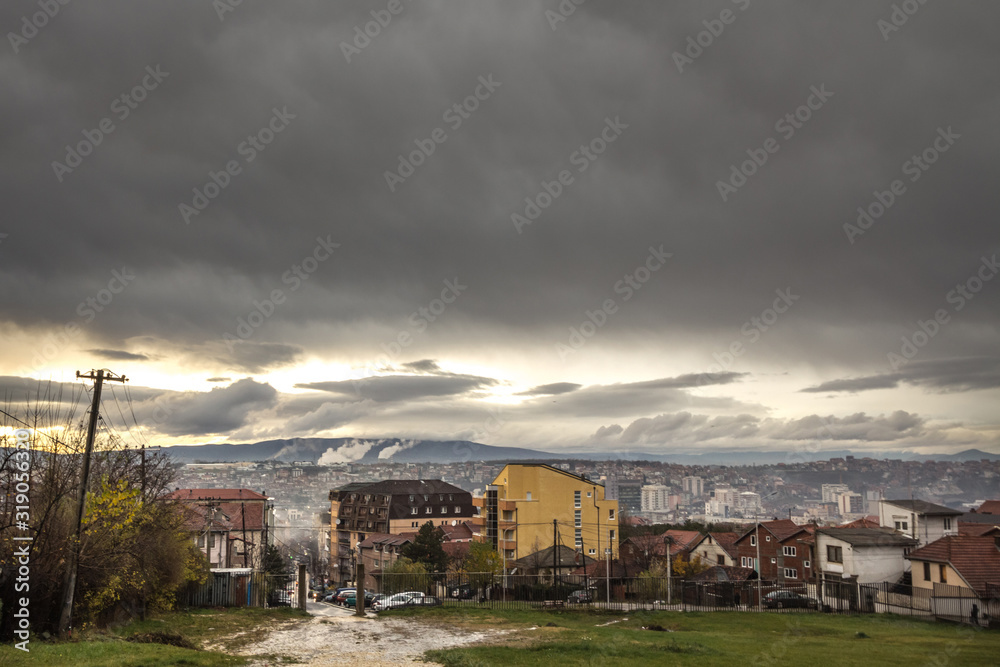 Panoramic aerial view of Prishtina, capital city of Kosovo, seen from the Velania hill during a cloudy rainy afternoon in autumn Panoramic aerial view of Prishtina, capital city of Kosovo, seen from the Velania hill during a cloudy rainy afternoon in autumn