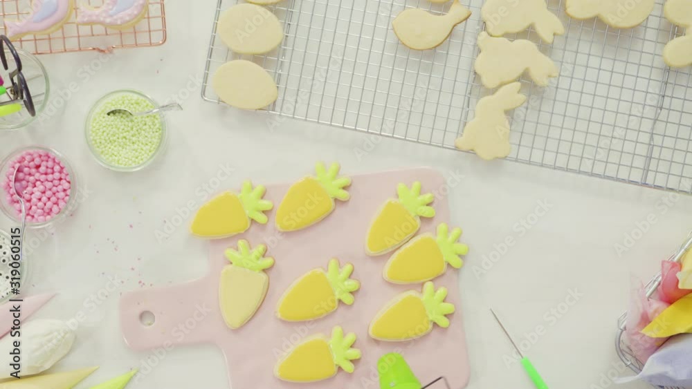 Step by step. Flat lay. Decorating Easter sugar cookies with royal icing. Step by step. Flat lay. Decorating Easter sugar cookies with royal icing.