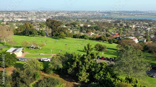 Aerial drone footage of Kate Sessions Park in Pacific Beach overlooking Mission Bay and Downtown San Diego, California.  photo