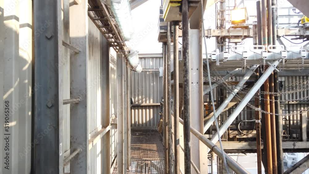 Walking around the derrick of the offshore drilling rig to money board ...