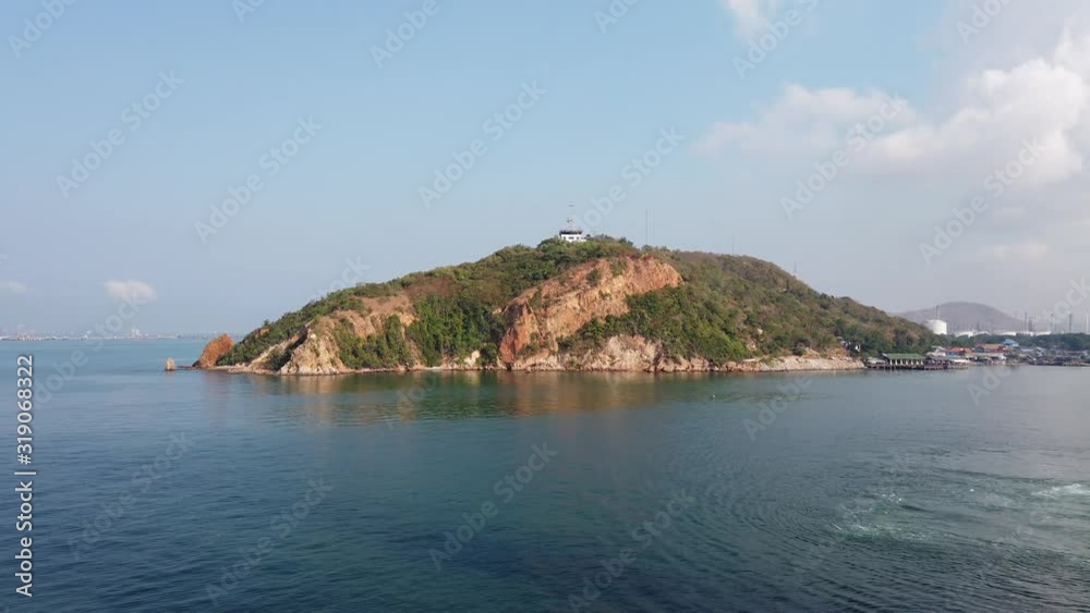 Laem Chabung Mountain (Khao Laem Chabang) in Chonburi Province, Thailand. View from the boat. Laem Chabung Mountain (Khao Laem Chabang) in Chonburi Province, Thailand. View from the boat.