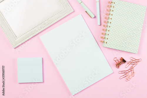 flat lay stationery collocate on work desk in pastel colorful background	