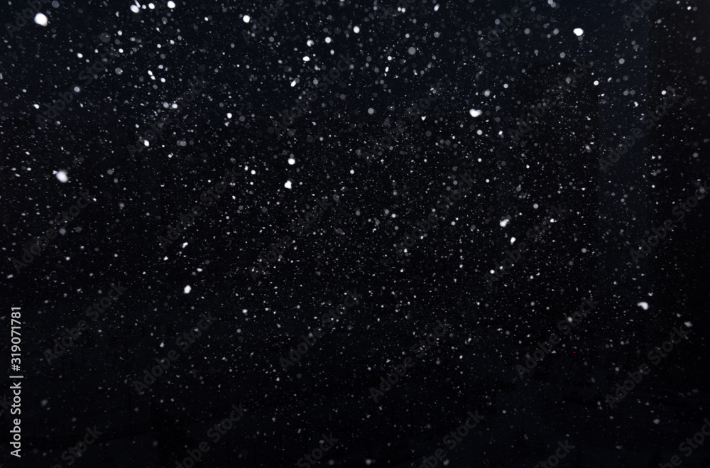snow on a black background. snow texture snow on a black background. snow texture