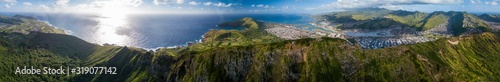 Aerial panorama of the island of Oahu as seen from the Koko Head mountain with Hanauma Bay and Honolulu city in the frame. Hawaii