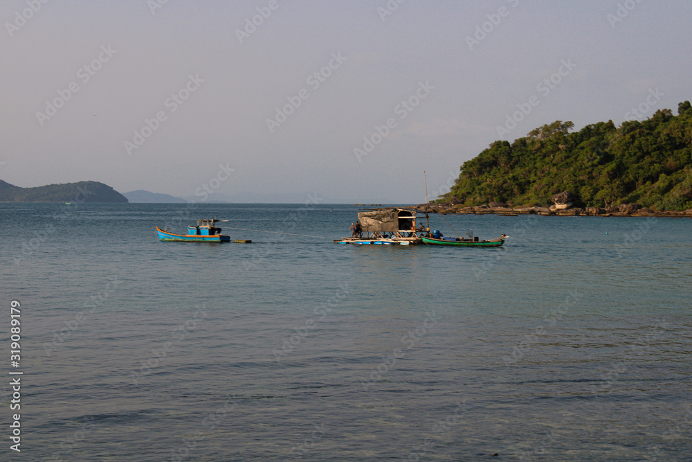 Beautiful and idyllic beach in southeast Asia. Bãi biển Gành Dầu beach with boats in north Phu Quoc, Vietnam.  