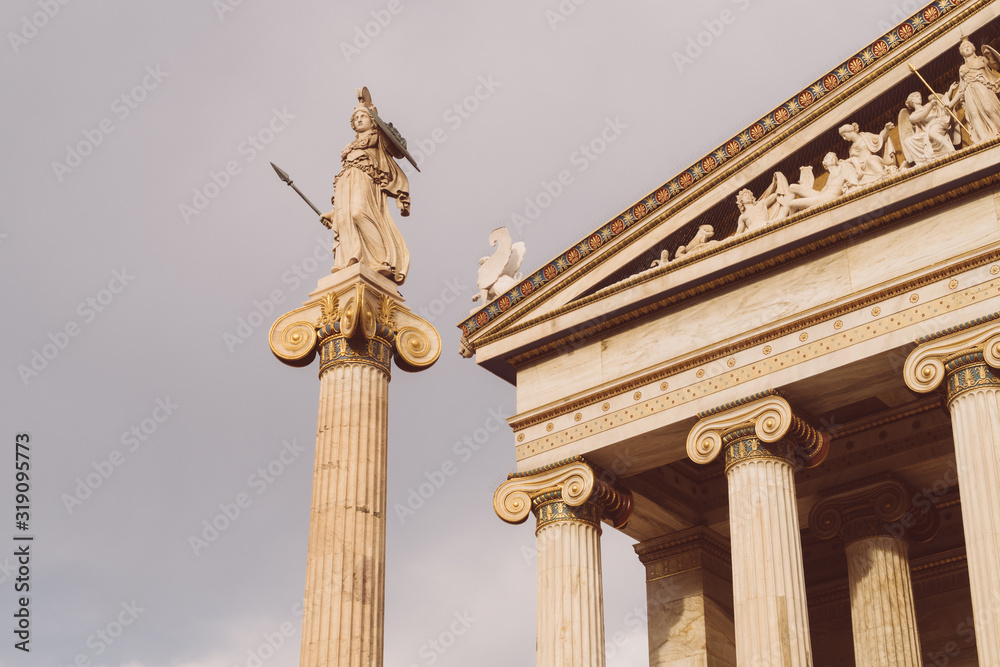 Athens, Greece - Dec 21, 2019:  Statue of Athena in front of the Academy of Arts, Athens, Greece, Europe