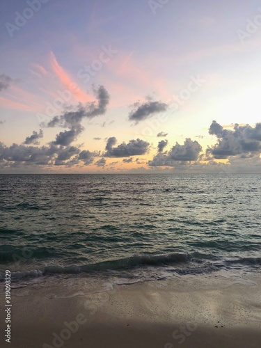 sunrise and clouds over the ocean © goodhart
