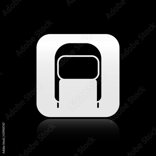 Black Winter hat with ear flaps icon isolated on black background. Silver square button. Vector Illustration