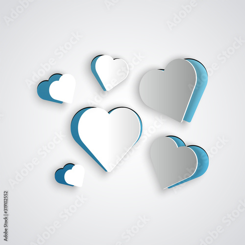 Paper cut Heart icon isolated on grey background. Romantic symbol linked, join, passion and wedding. Valentine day symbol. Paper art style. Vector Illustration