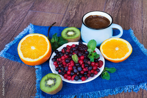 Healthy Breakfast with Forest Fruits,Orange and Coffee 