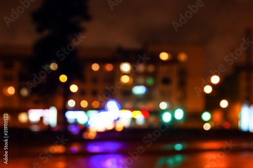 Street city lights out of focus at night, bokeh
