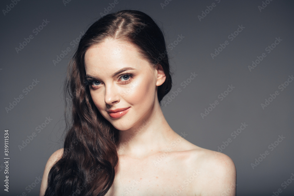 Beauty woman face natural make up long brunette hair female