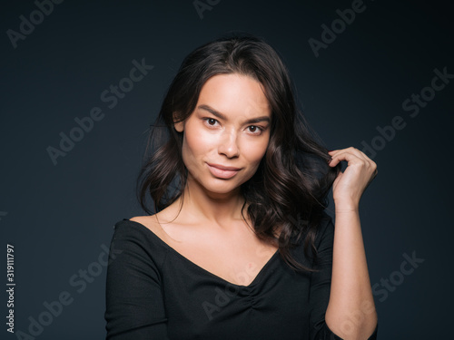 Asia woman portrait dark background