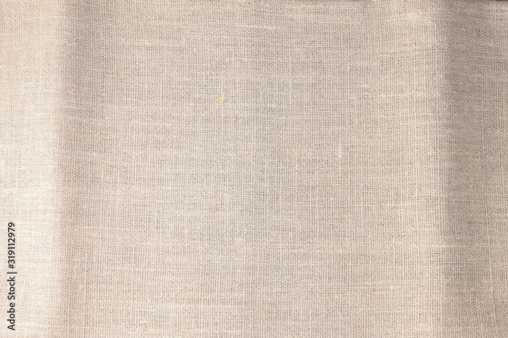 Beige linen fabric cotton for wallpaper design. Beige linen fabric cotton for wallpaper design.