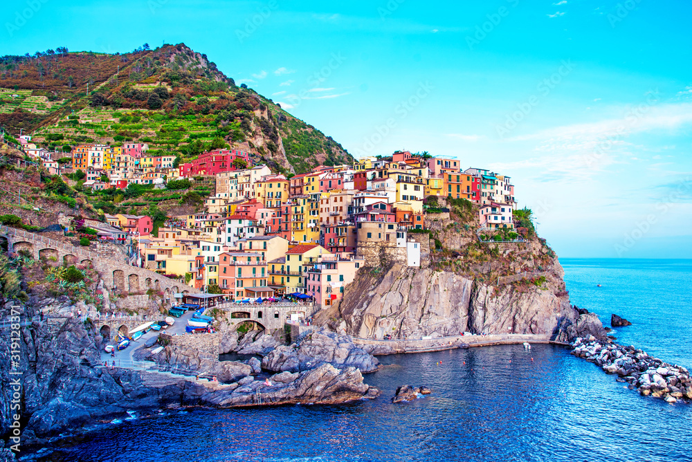 Beautiful magic colorful summer landscape on the coast of Manarola in Cinque Terre, Liguria, Italy.  Exotic amazing places. Popular tourist atraction.