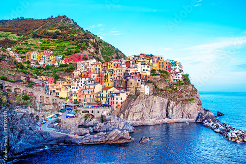 Beautiful magic colorful summer landscape on the coast of Manarola in Cinque Terre, Liguria, Italy. Exotic amazing places. Popular tourist atraction.
