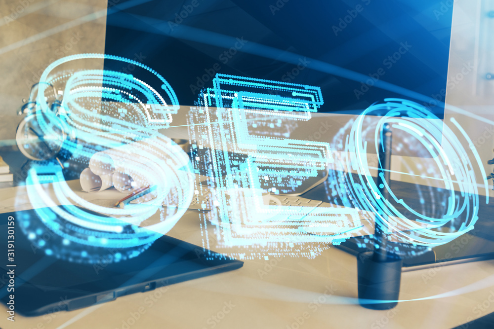 Multi exposure of table with computer and seo drawing hologram. Search optimization concept. Multi exposure of table with computer and seo drawing hologram. Search optimization concept.