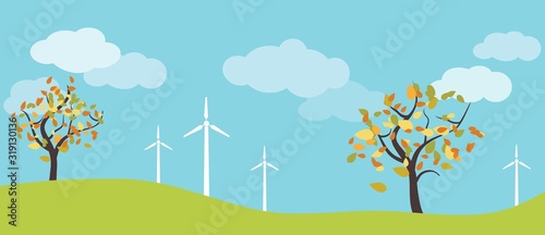 Wind farm in green fields among trees. Ecological or environmental background for presentations, websites and infographics.