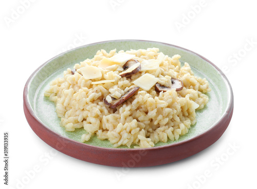 Delicious risotto with cheese and mushrooms isolated on white