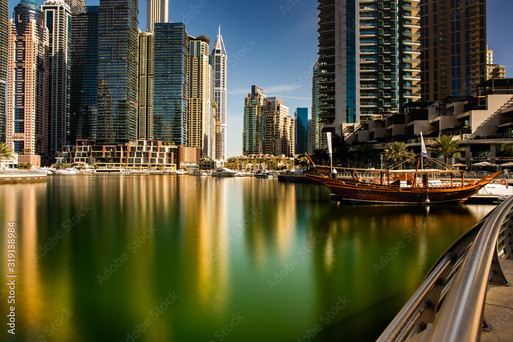 Fototapeta premium Dubai/UAEmirates - jan 18, 2020: promenade view of Dubai Marina in the north east direction with a view of the numerous buildings that are more than 100 meters high