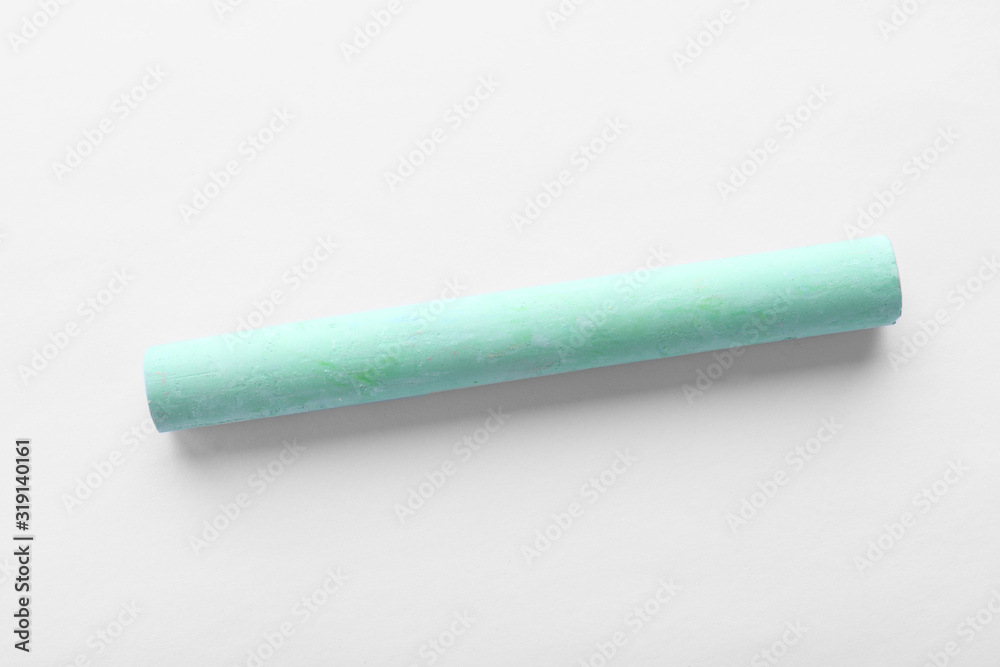 Piece of green chalk isolated on white, top view Piece of green chalk isolated on white, top view