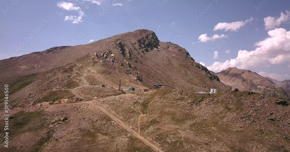View from Mount Cheget to Mount Elbrus from a height. View from Mount Cheget to Mount Elbrus from a height.
