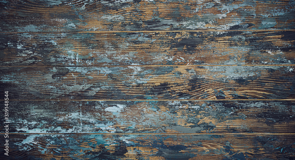 Old shabby wooden boards, background with traces of blue paint, texture of old wood, vintage, rustic, traces of paint, dark blue, brown,black