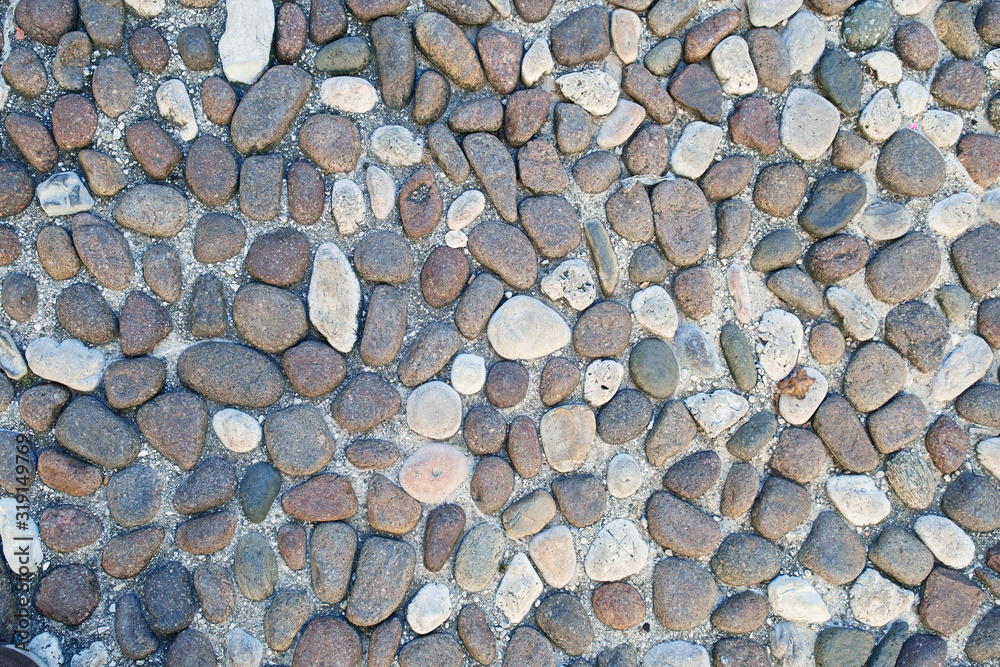 Pavement pebble pathway pattern texture background, the part of italian old style stone sidewalk Pavement pebble pathway pattern texture background, the part of italian old style stone sidewalk
