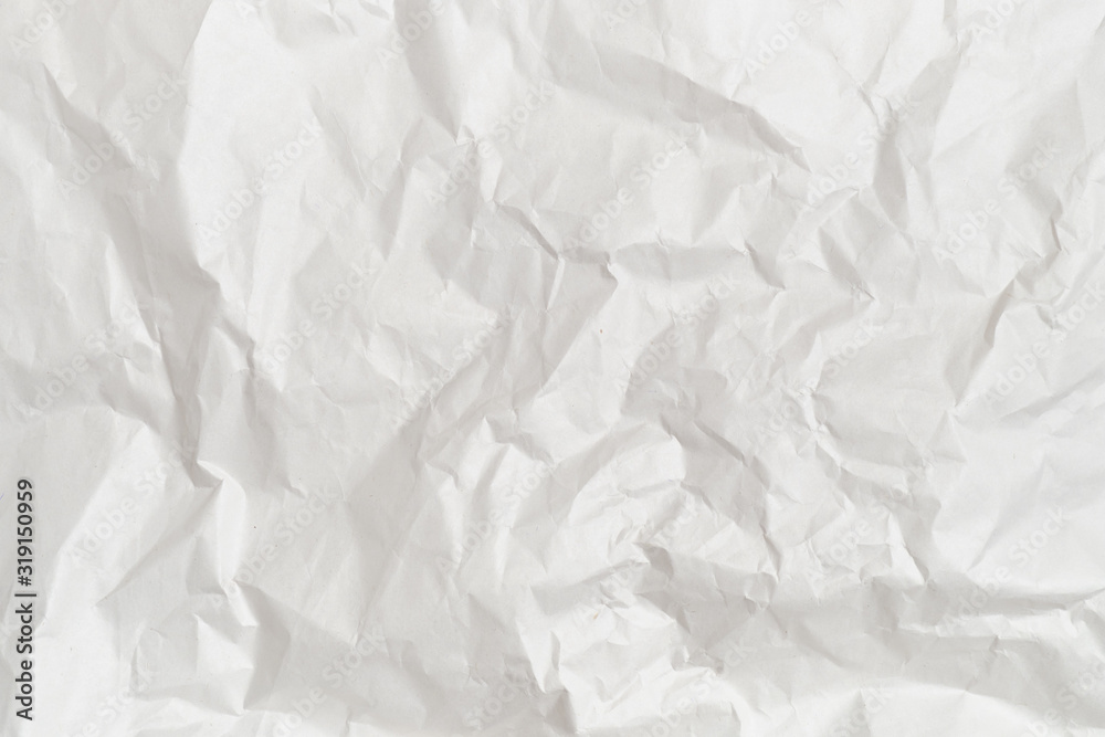 The background and texture of white crumpled paper. The background and texture of white crumpled paper.
