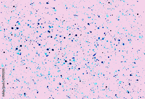 Modern abstract pattern of blue watercolor chaotic splashes on a spicy pink background