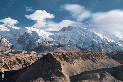 Snow mountain and rocky canyon located in Xinjiang China pamir plateau.