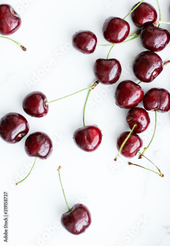 Fresh sweet cherries, juicy cherry berries fruit dessert as healthy diet background photo