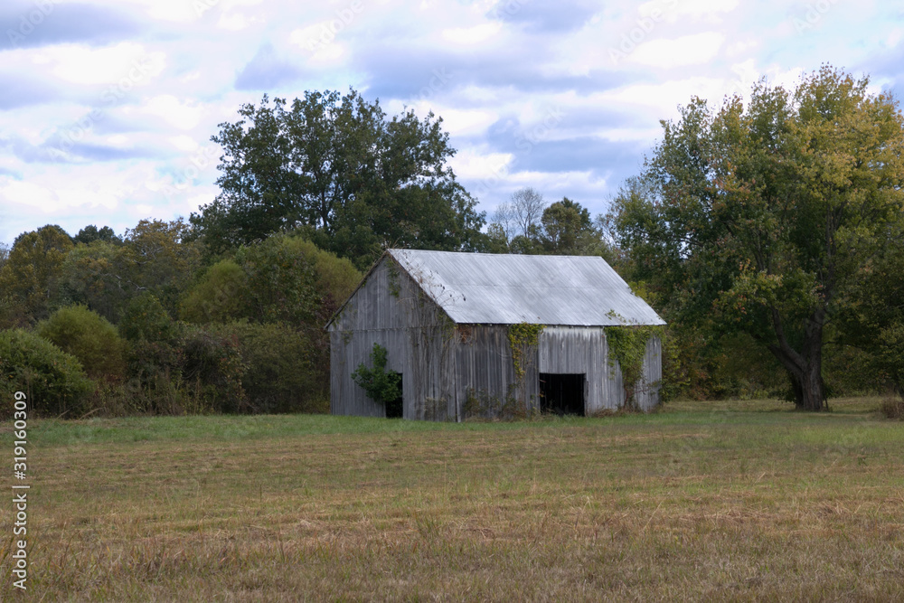 old barn in field old barn in field