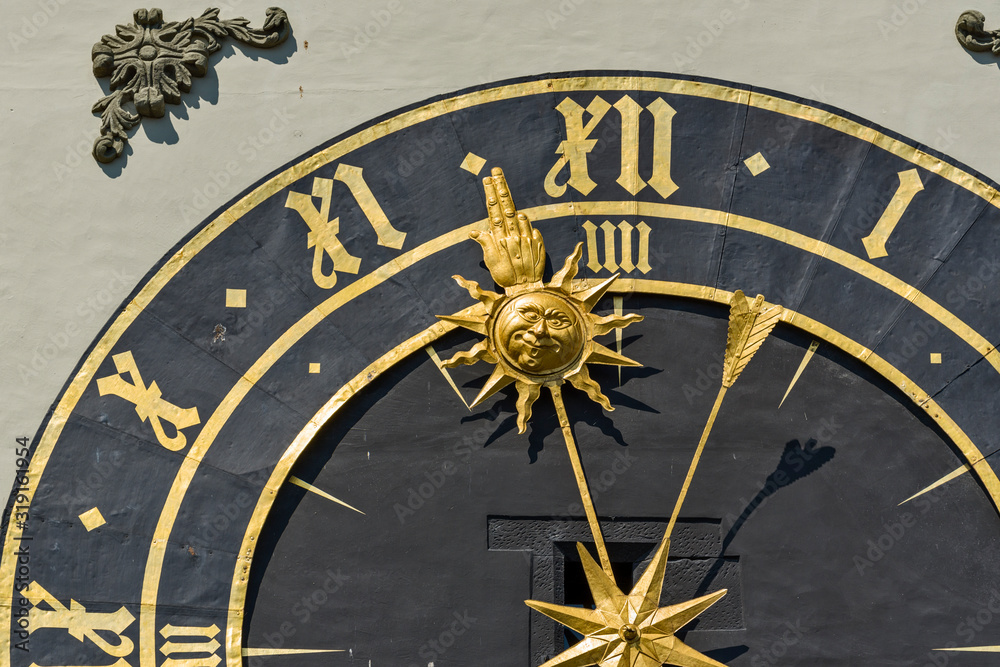 branch with the sun on the zytglogge clock tower in Bern, Switzerland