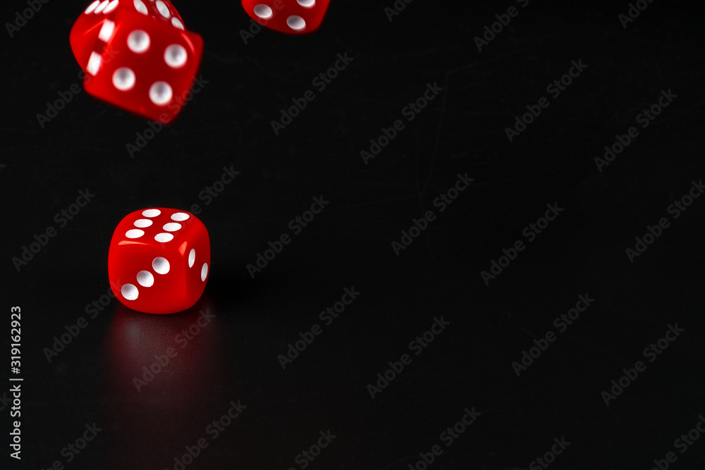 Group of dice close up on dark black background Group of dice close up on dark black background