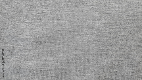 abstract background of old grey knit fabric close up