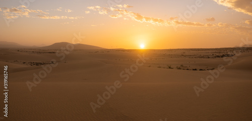 Sand dunes in the National Park of Dunas de Corralejo during a beautiful sunset, Canary Islands - Fuerteventura