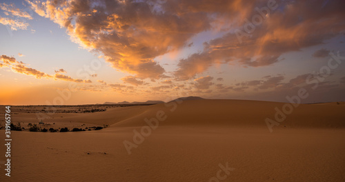Sand dunes in the National Park of Dunas de Corralejo during a beautiful sunset, Canary Islands - Fuerteventura © Mike Mareen