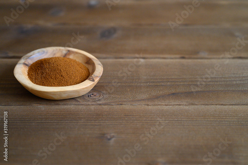 chaga tea mushroom from birch tree using for healing tea or coffee in folk medicine. ground powder