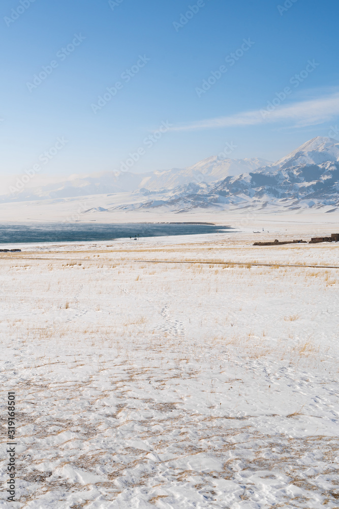 China Xinjiang Sayram Lake(sailimu hu) in winter. Climate and travel concept. China Xinjiang Sayram Lake(sailimu hu) in winter. Climate and travel concept.