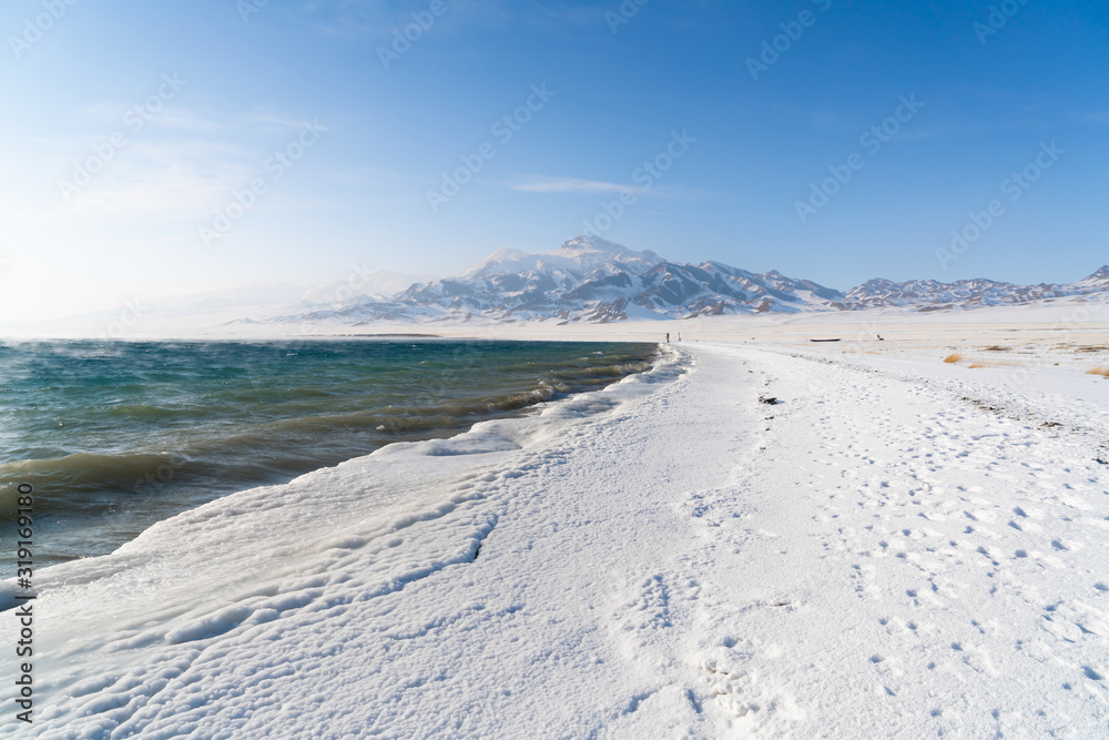 China Xinjiang Sayram Lake(sailimu hu) in winter. Climate and travel concept. China Xinjiang Sayram Lake(sailimu hu) in winter. Climate and travel concept.