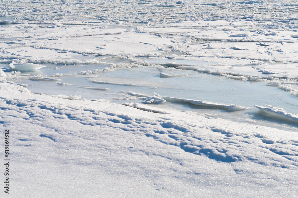 White snow surface texture with soft shadow. White snow surface texture with soft shadow.