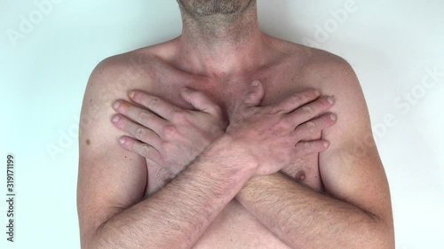 caucasian man with both hands on his chest isolated on White background