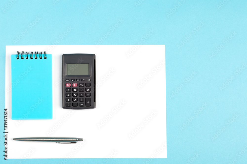 workspace top view. office Desk with office supplies. top view blue background workspace top view. office Desk with office supplies. top view blue background