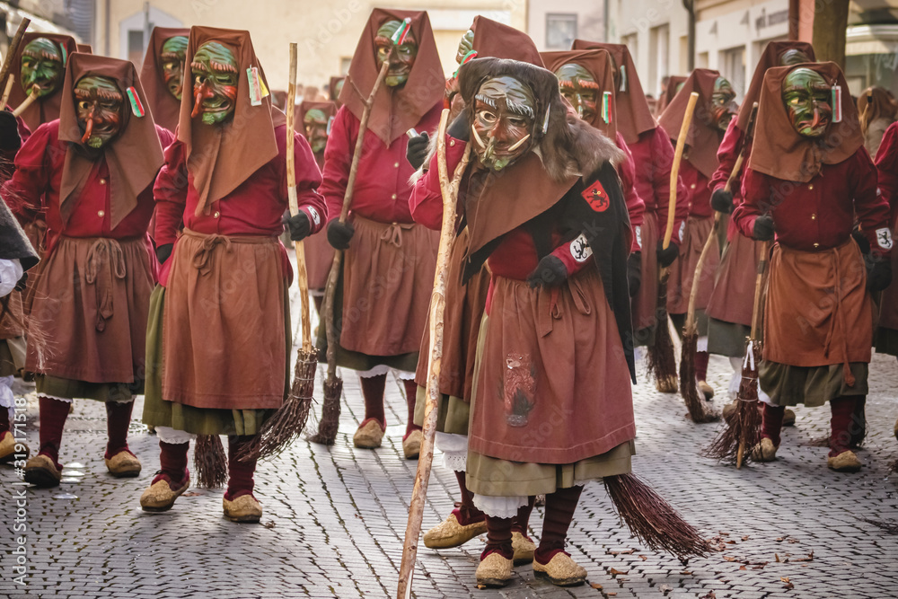 Festival participants dressed up in handmade costume and mask at the Ulmzug carnival event.