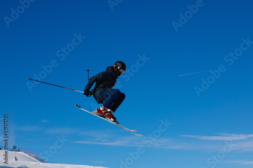 Skier jumps in air