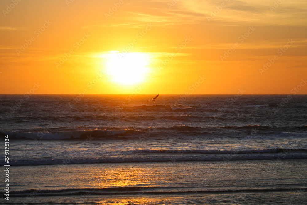 Windsurfing  at sunset